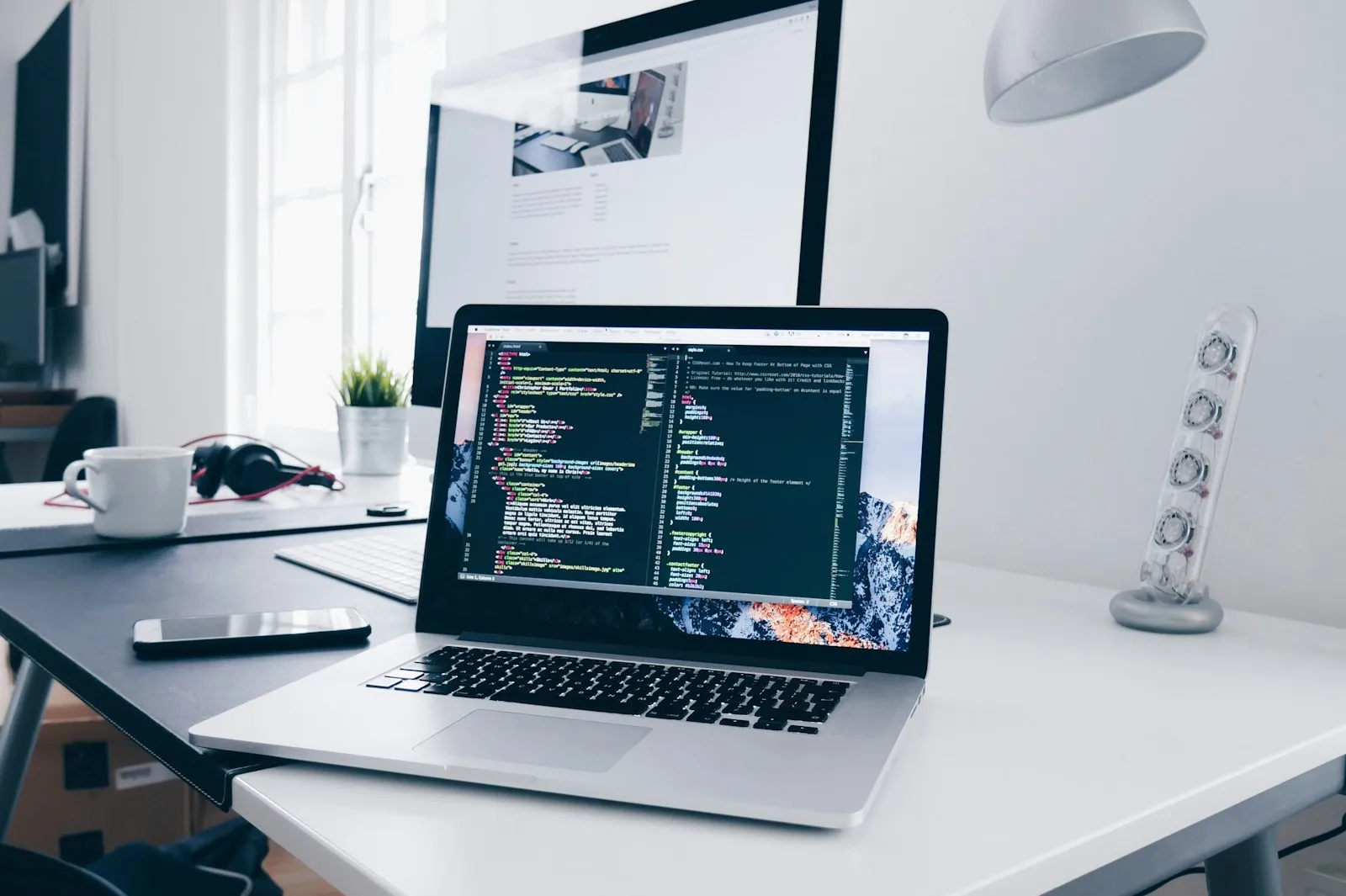 Cloud engineers reviewing infrastructure diagrams on large displays